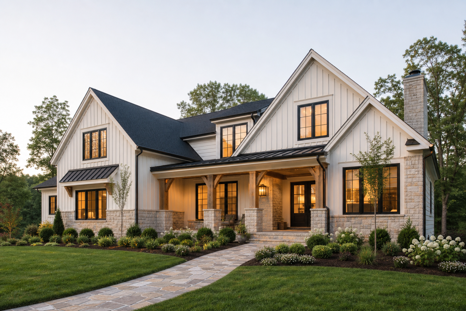 Modern American farmhouse exterior with covered porch and stone landscaping